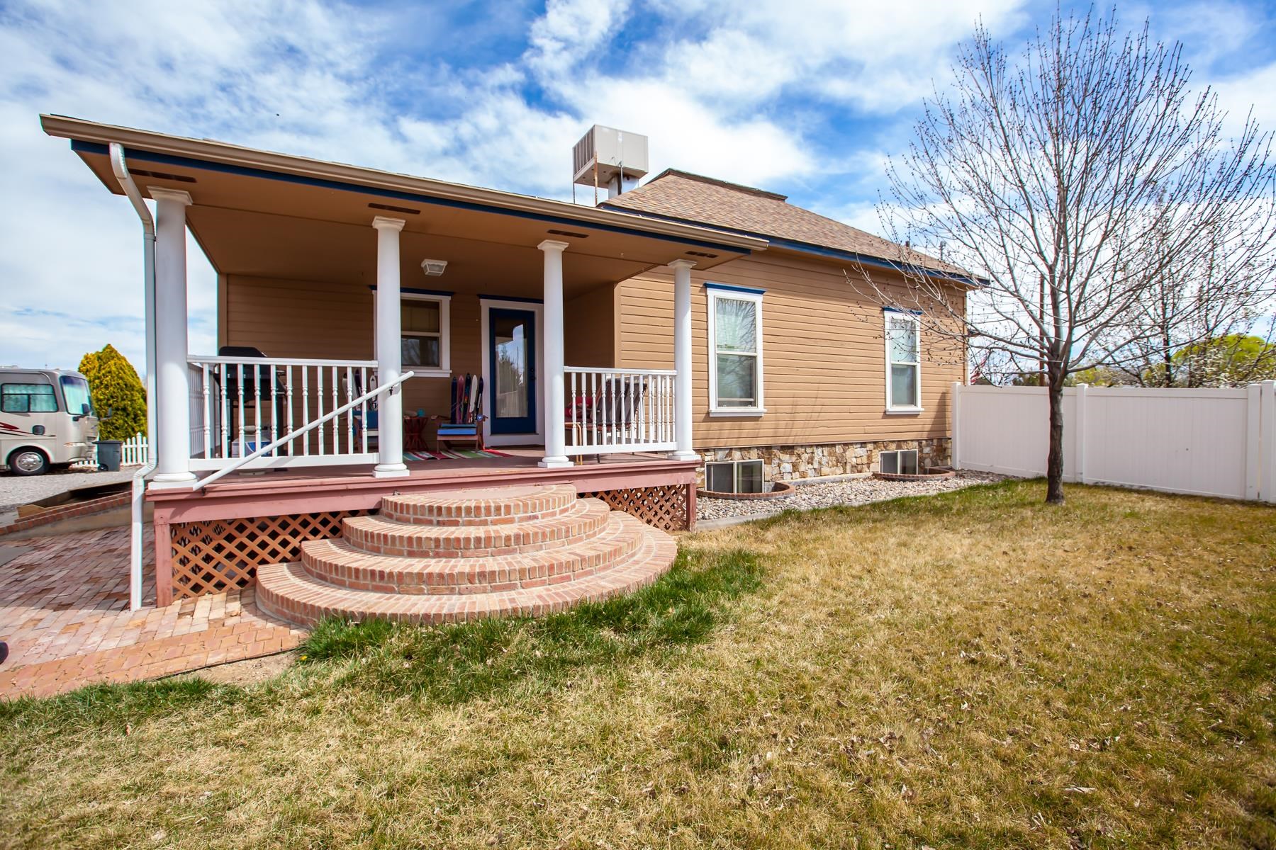 225 29 Road Grand Junction, CO 81503 - Photo 10 of 41 front view of a house with a yard