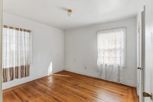 an empty room with window