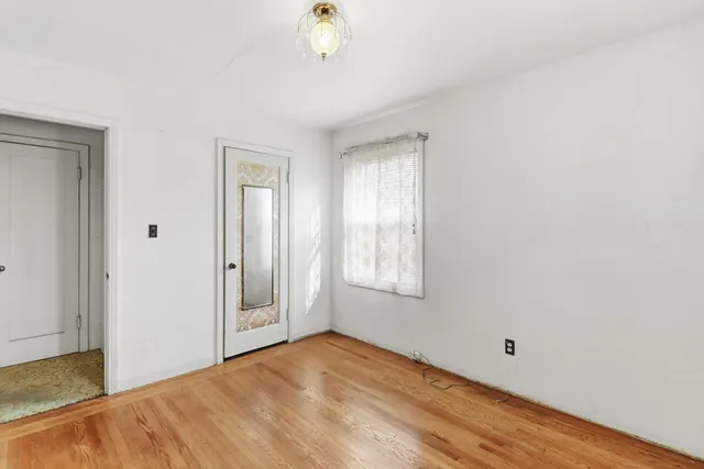 a bathroom with a shower curtain and a shower curtain