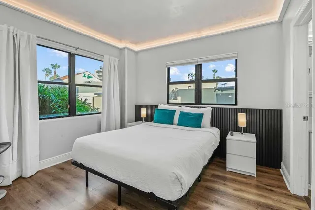 a bedroom with a bed and closet