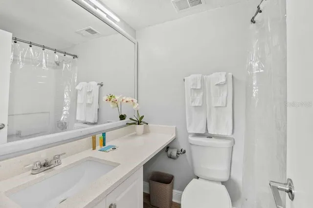 a view of a swimming pool with a yard