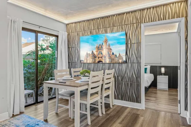 a view of a dining table and chairs in patio