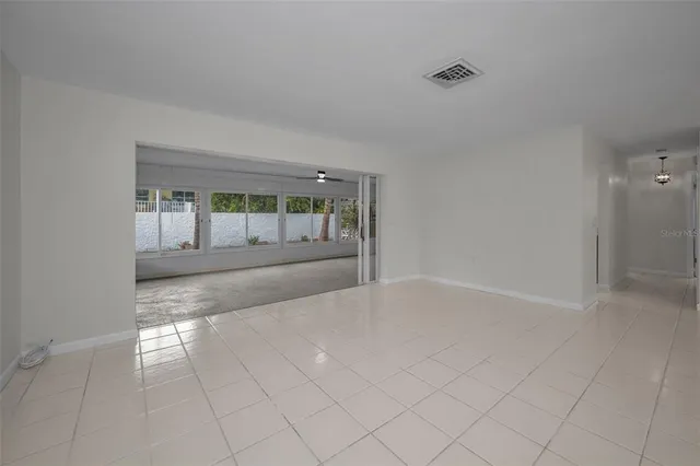 an empty room with windows