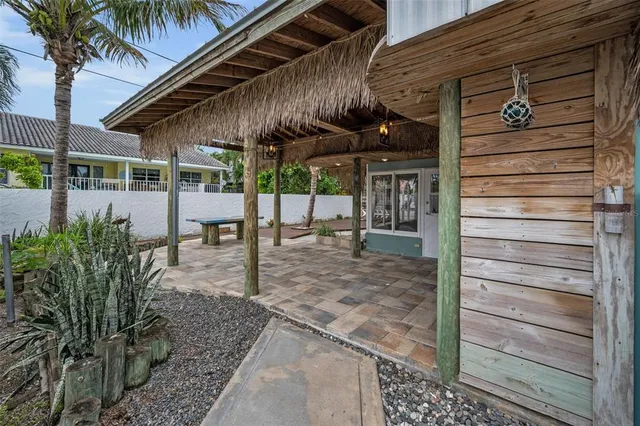 a view of a wooden deck with a yard