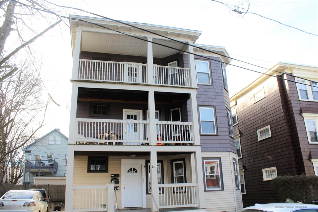 14 Ginita Street, Unit 1 Boston, MA 02122 - Photo 8 of 12 a front view of a house with balcony