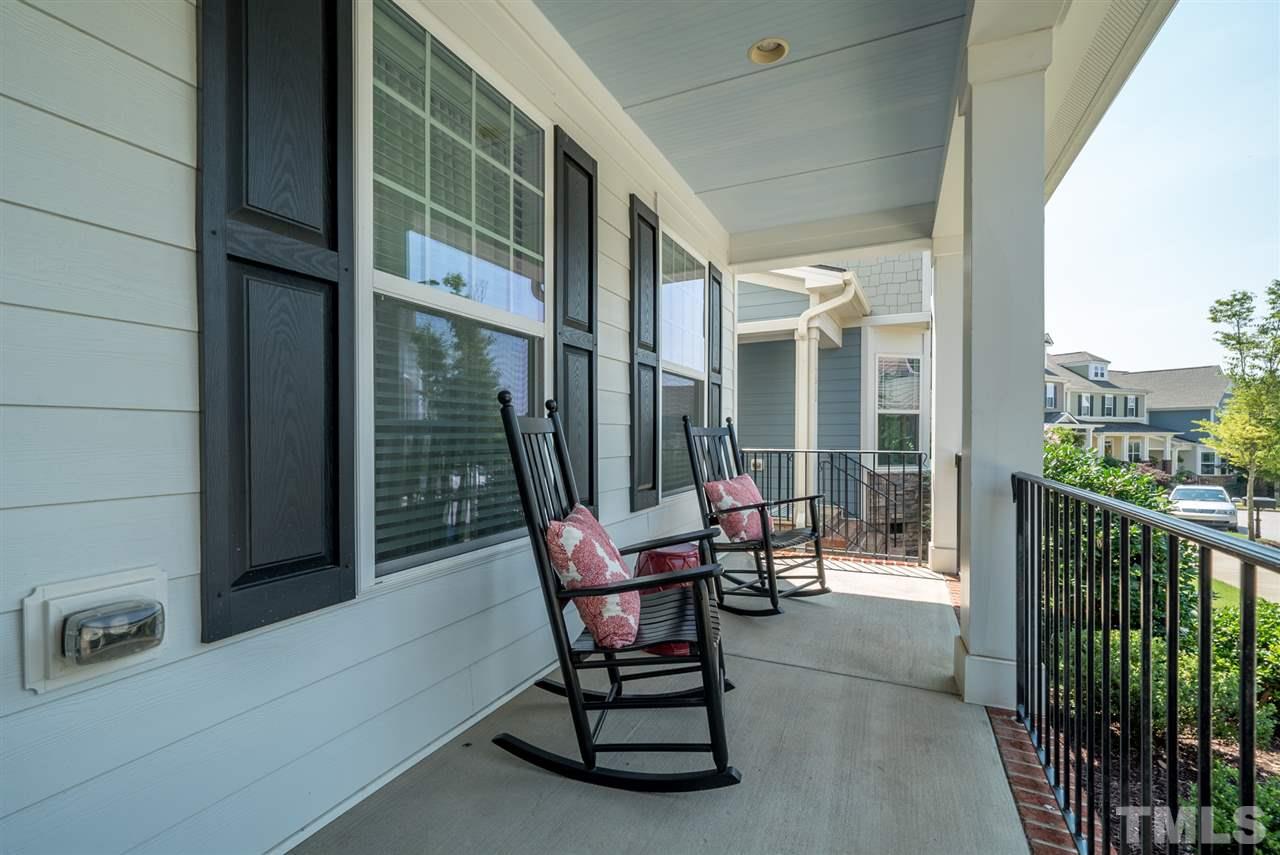 1564 Rodessa Run Raleigh, NC 27607 - Photo 2 of 25 a building outdoor space with patio furniture and garden
