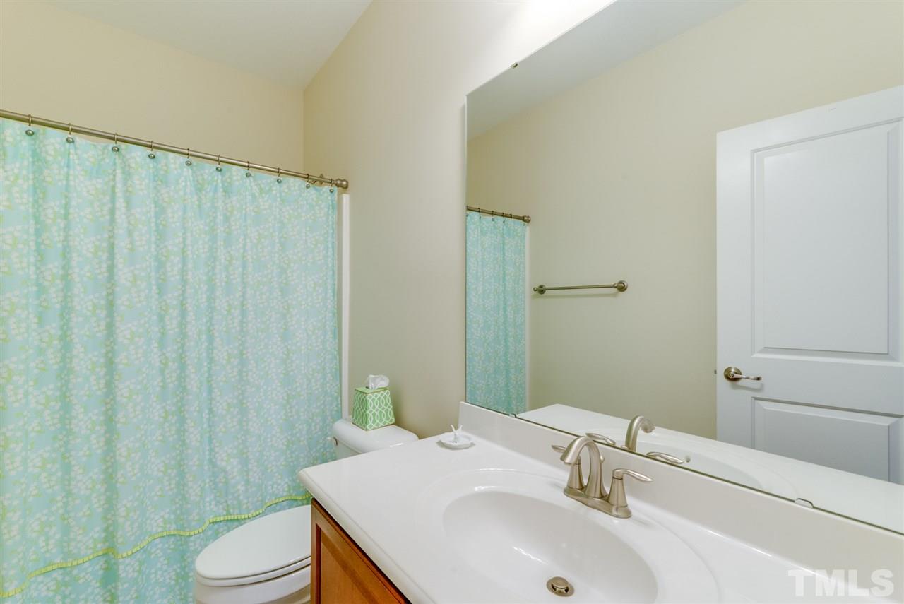 1564 Rodessa Run Raleigh, NC 27607 - Photo 19 of 25 a bathroom with a sink and toilet