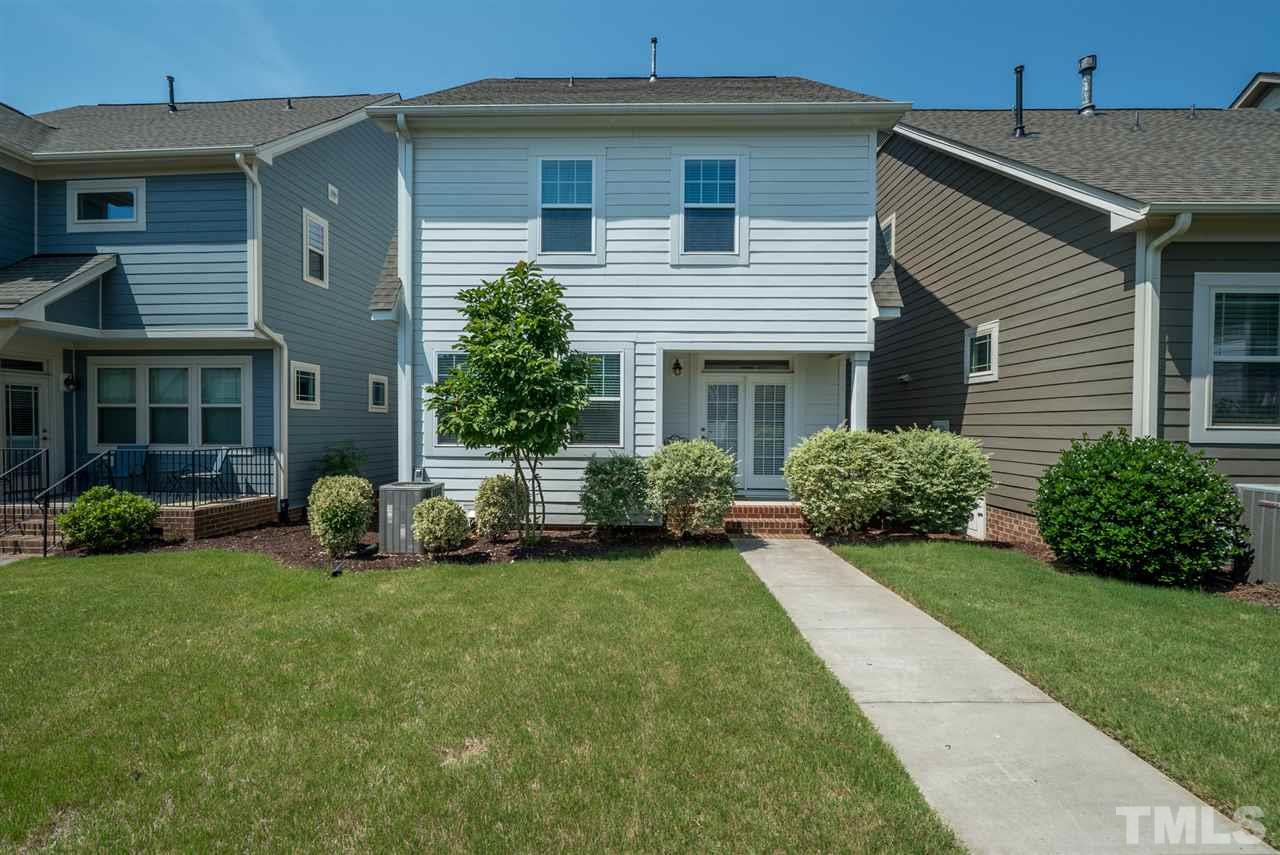 1564 Rodessa Run Raleigh, NC 27607 - Photo 22 of 25 a view of a house with a yard and sitting area