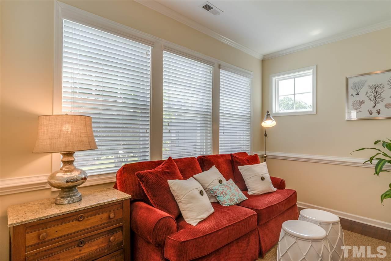 1564 Rodessa Run Raleigh, NC 27607 - Photo 7 of 25 a living room with furniture and a window