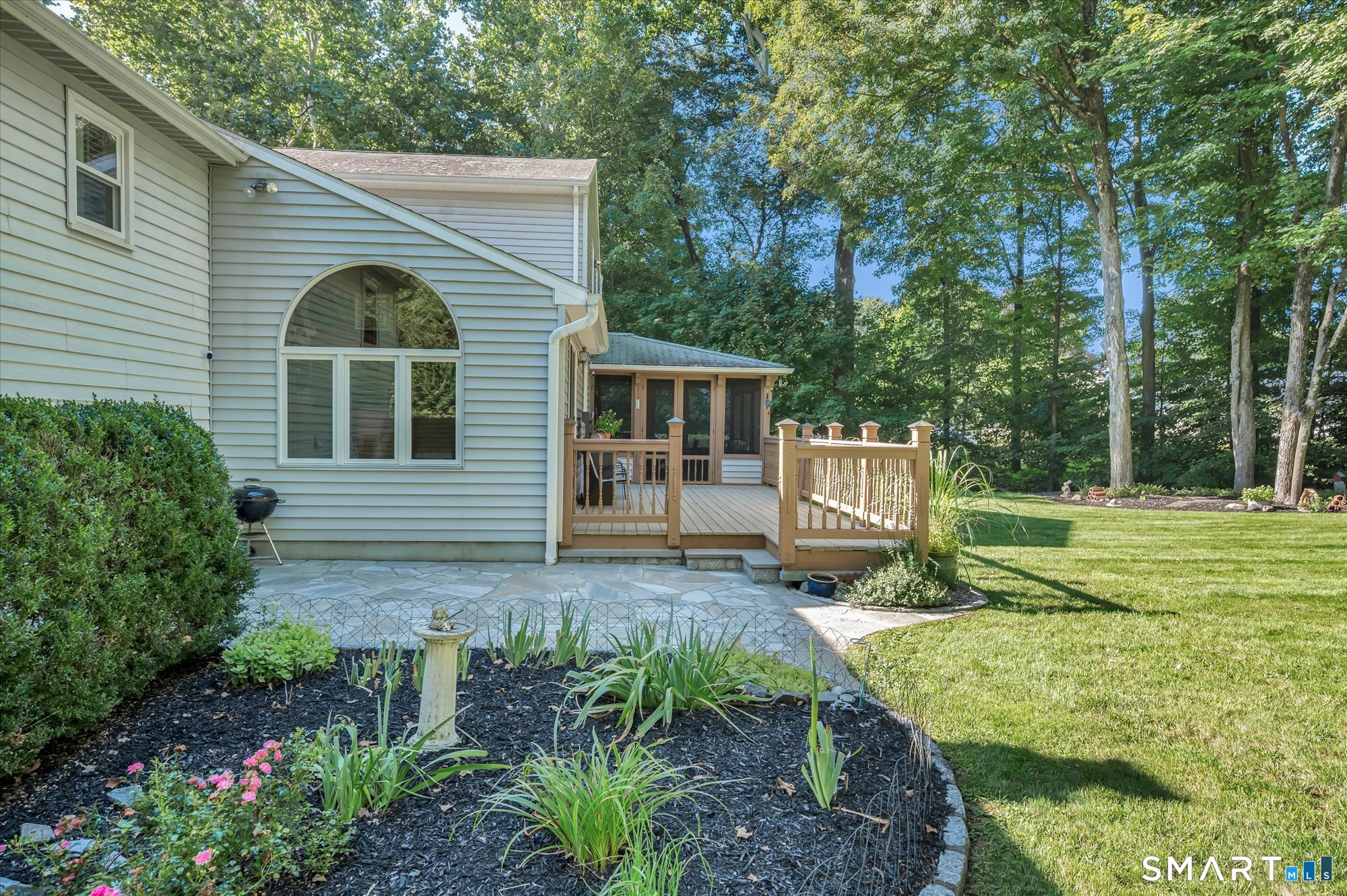 65 R Hanover Street Wallingford, CT 06492 - Photo 28 of 37 Patio to the side of the deck.