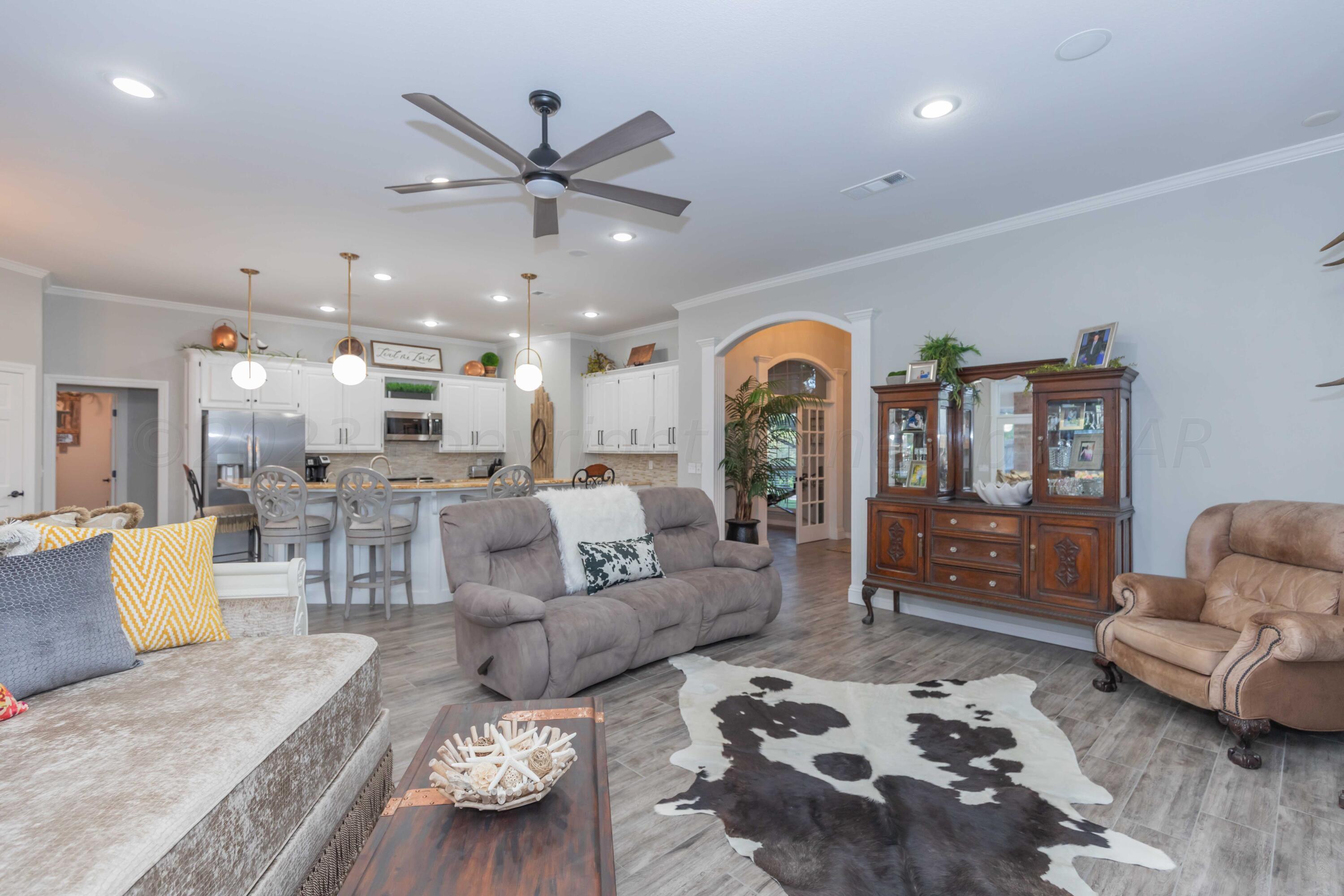 2308 Madera Place Amarillo, TX 79124 - Photo 11 of 61 a living room with furniture and a large window