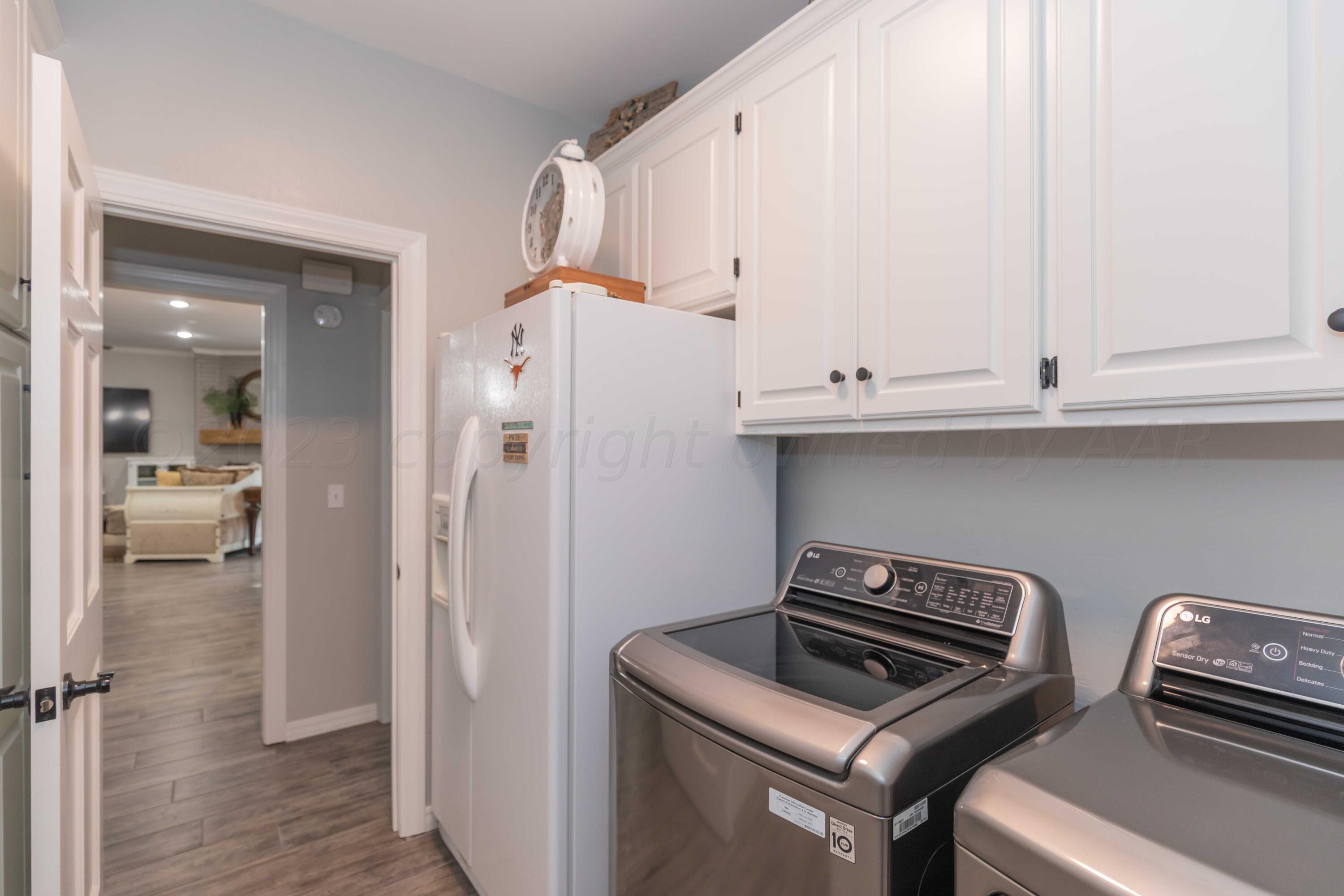 2308 Madera Place Amarillo, TX 79124 - Photo 24 of 61 a kitchen with appliances and cabinets