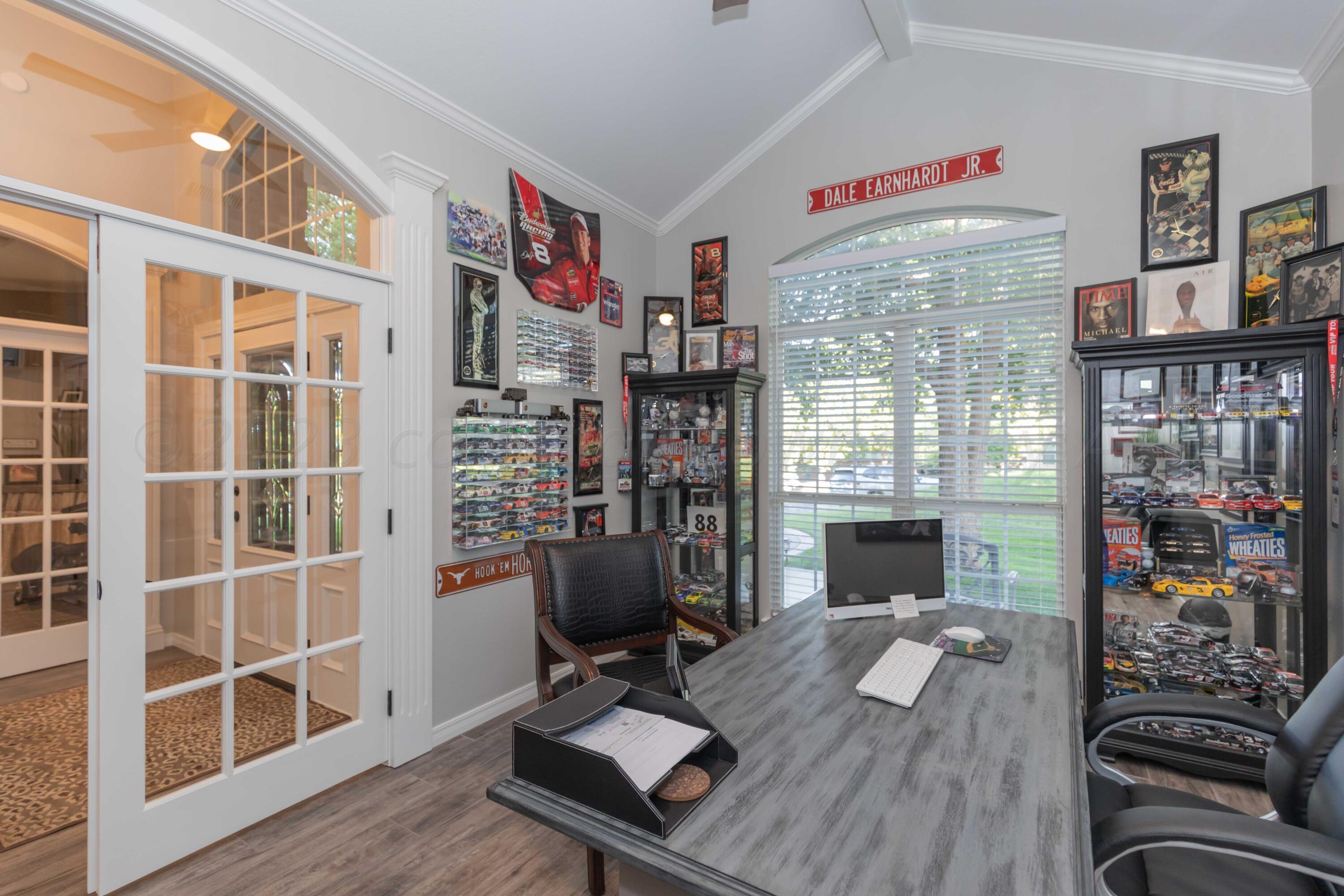 2308 Madera Place Amarillo, TX 79124 - Photo 28 of 61 a view of a workspace with furniture and a window