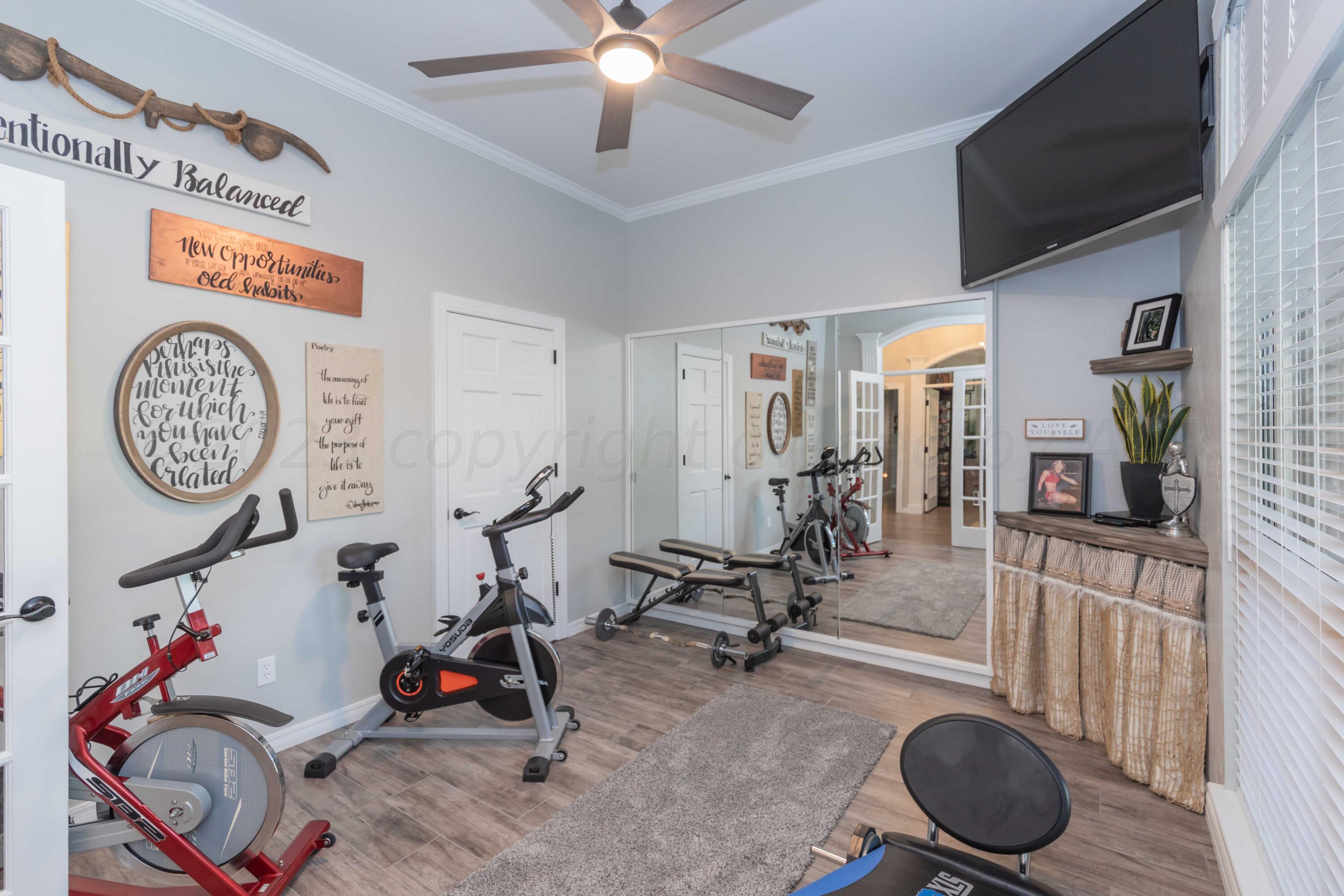 2308 Madera Place Amarillo, TX 79124 - Photo 42 of 61 a view of a room with gym equipment