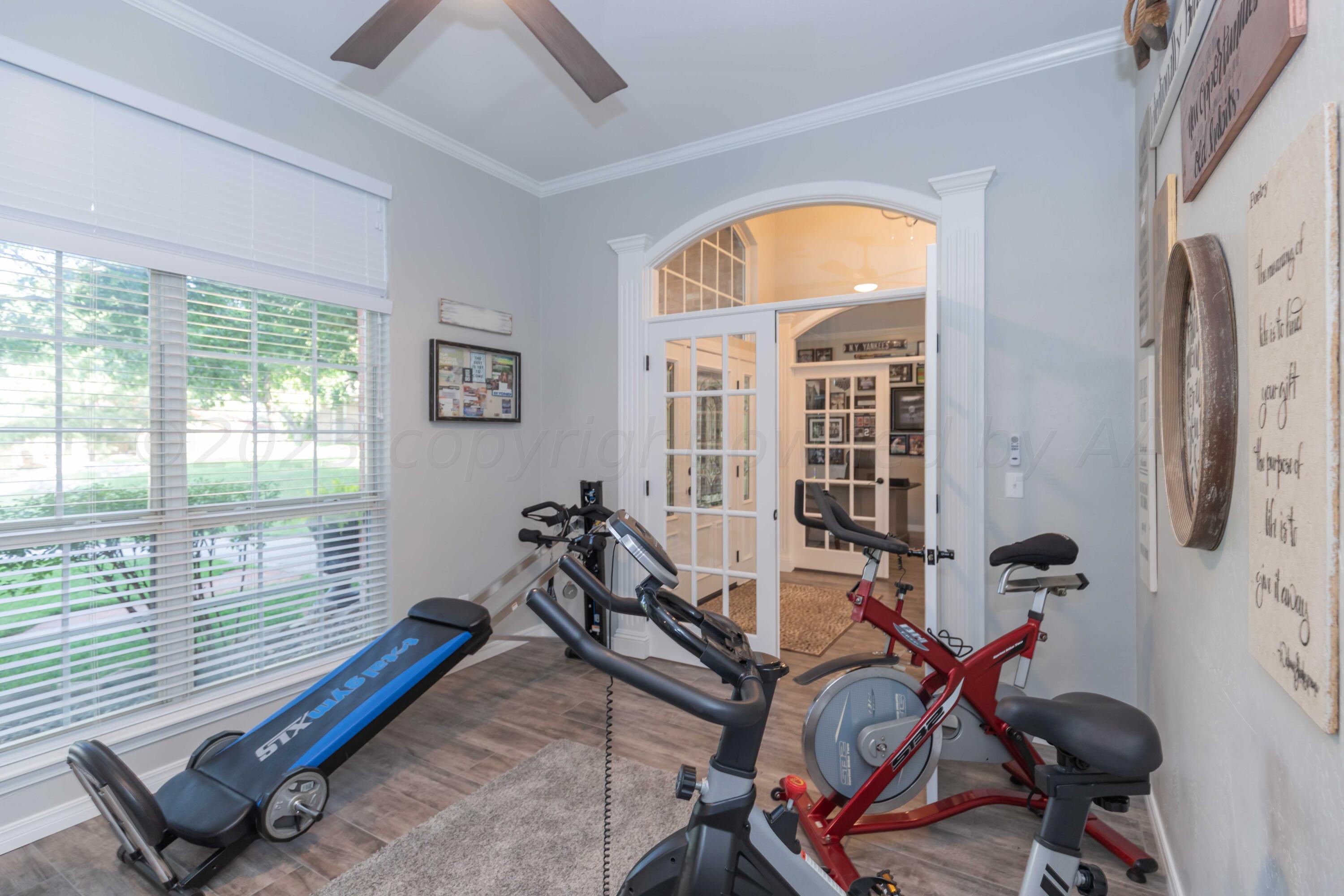 2308 Madera Place Amarillo, TX 79124 - Photo 44 of 61 a view of a room with gym equipment