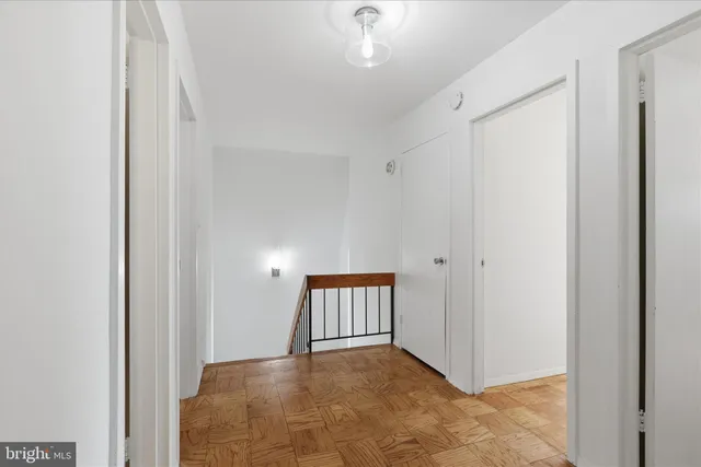 a living room with furniture fireplace and flat screen tv