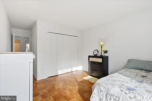 a view of workspace with wooden floor windows