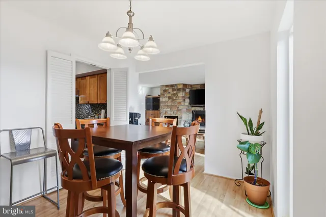 a kitchen with stainless steel appliances a stove sink and refrigerator