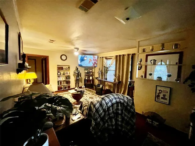 a bed room with furniture and a window