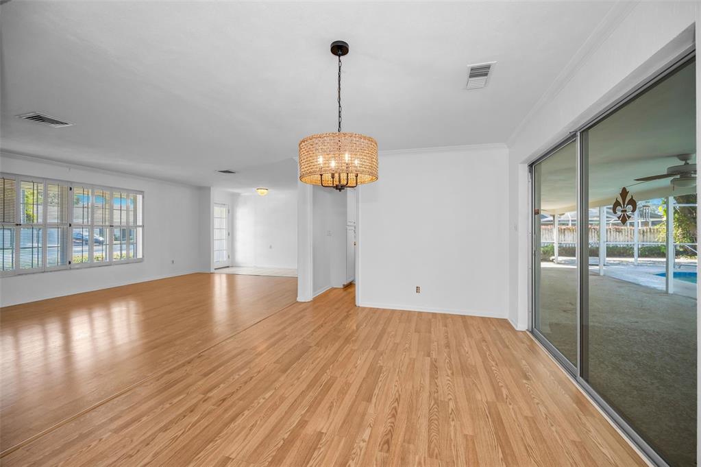 4 Hibiscus Road Belleair, FL 33756 - Photo 23 of 75 a view of a room with wooden floor and windows