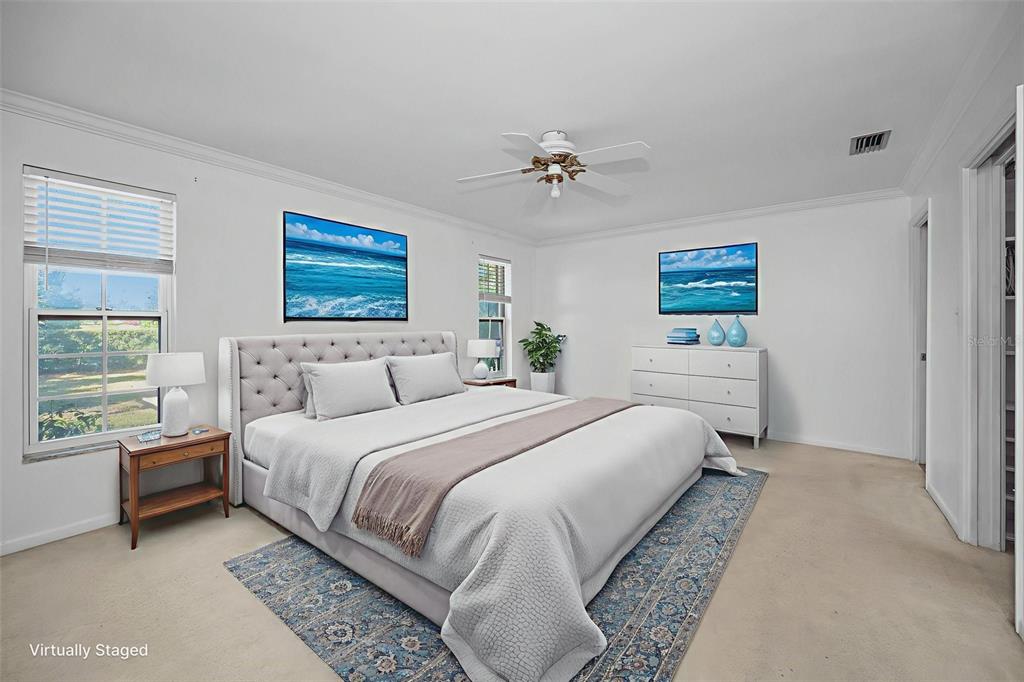 4 Hibiscus Road Belleair, FL 33756 - Photo 35 of 75 a spacious bedroom with a bed and a window