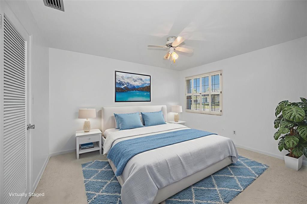 4 Hibiscus Road Belleair, FL 33756 - Photo 41 of 75 a bedroom with a bed and a window