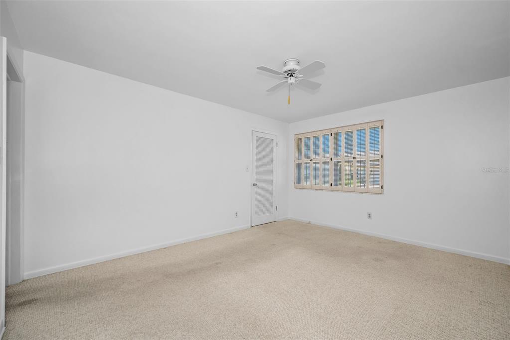 4 Hibiscus Road Belleair, FL 33756 - Photo 45 of 75 a view of an empty room with a window