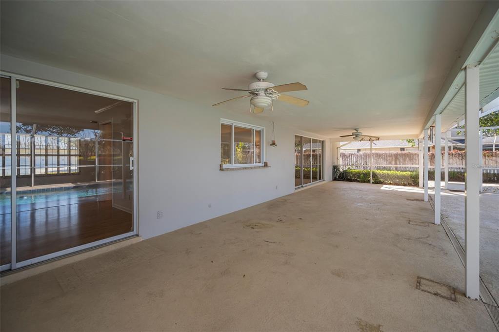 4 Hibiscus Road Belleair, FL 33756 - Photo 49 of 75 a view of a room with a ceiling fan
