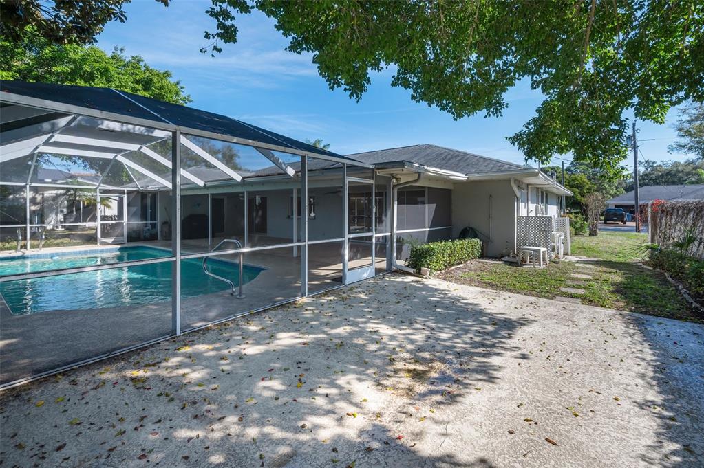 4 Hibiscus Road Belleair, FL 33756 - Photo 56 of 75 a view of a house with backyard and porch