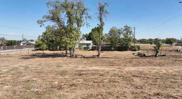 a view of backyard with outdoor space