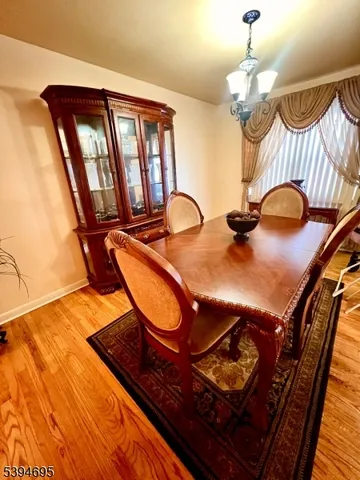 a bathroom with a sink mirror and vanity