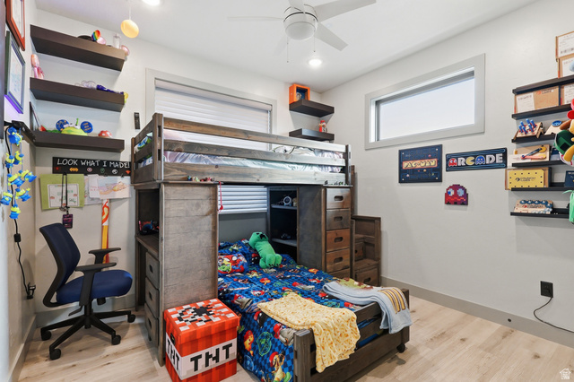 175 North 100 West Providence, UT 84332 - Photo 21 of 45 Bedroom featuring light wood-type flooring and a ceiling fan