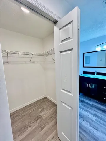 a view of an empty walk in closet