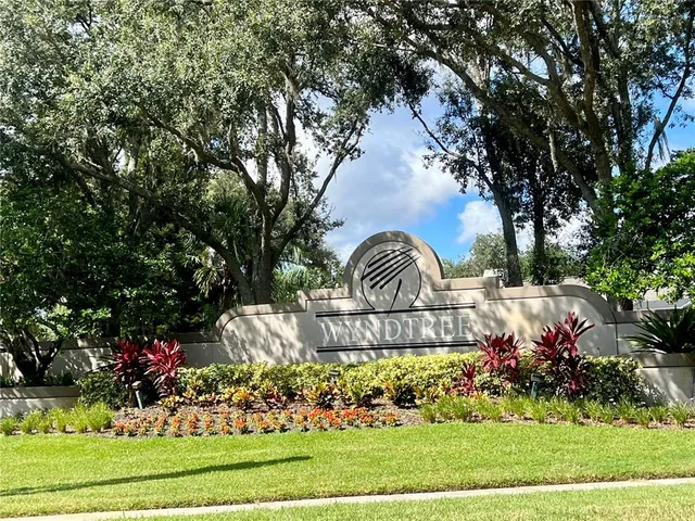 a view of statue in a garden