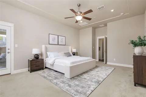 a living room with furniture and windows