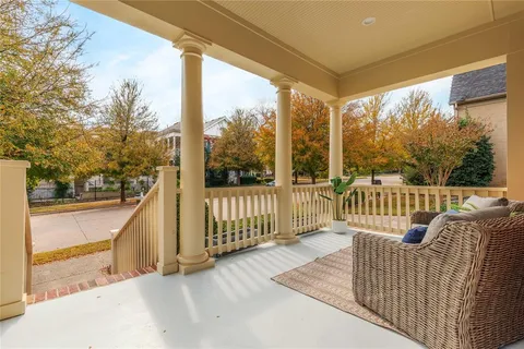 a view of a two chairs in the balcony