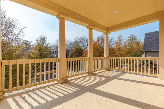 a view of a livingroom with furniture and a potted plant