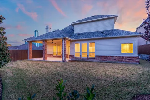 a view of a patio with swimming pool table and chairs