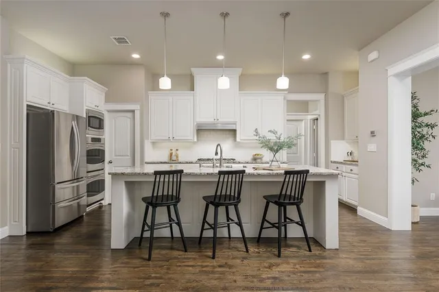 a view of a livingroom with furniture and a fireplace