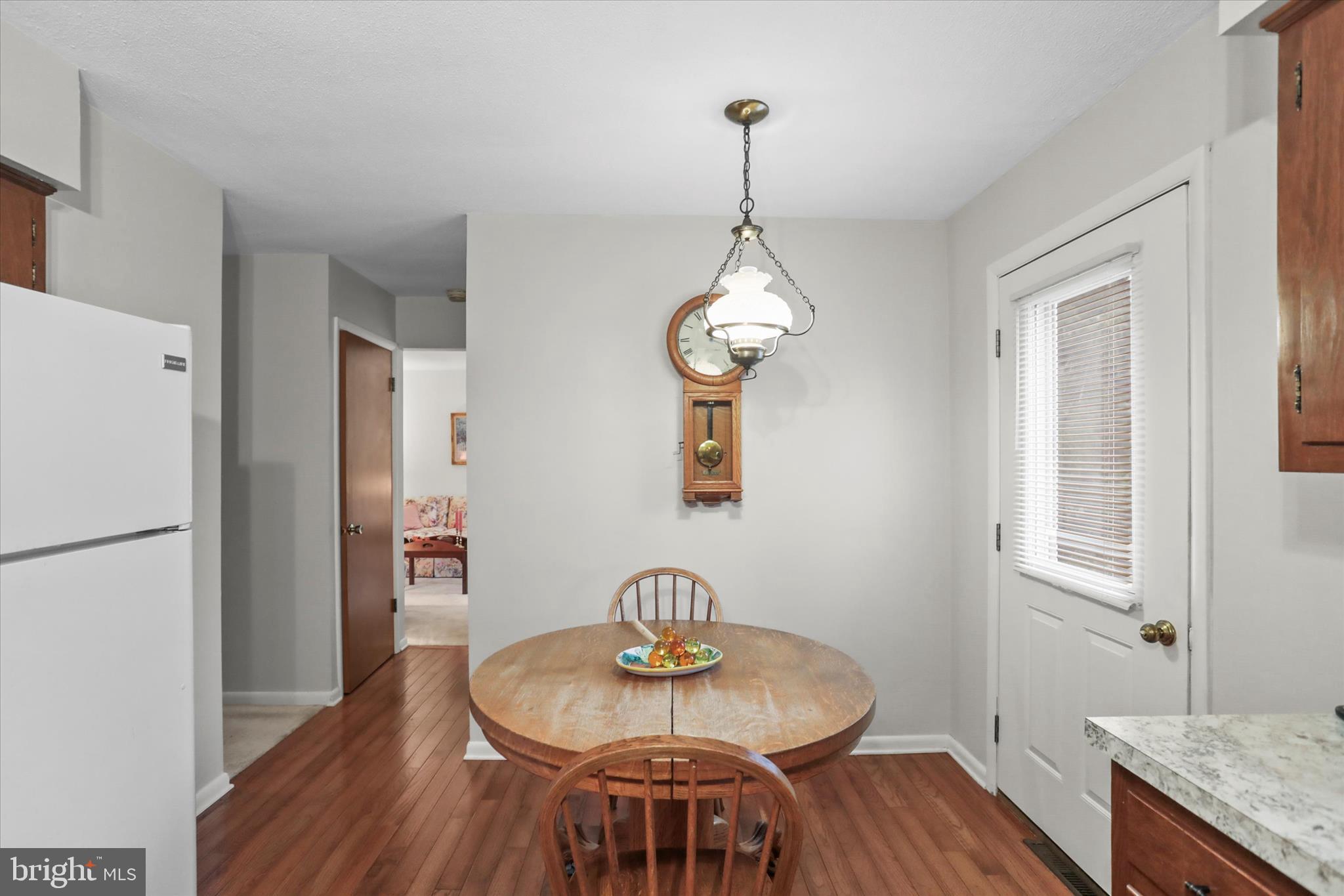 114 Lexington Road York, PA 17402 - Photo 15 of 49 a view of a dining room with furniture and wooden floor