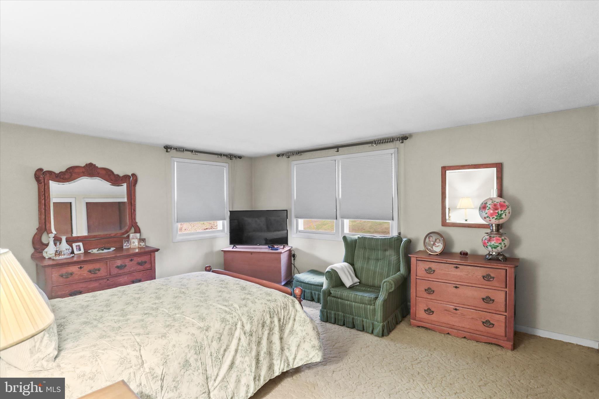 114 Lexington Road York, PA 17402 - Photo 19 of 49 a bedroom with a bed and furniture