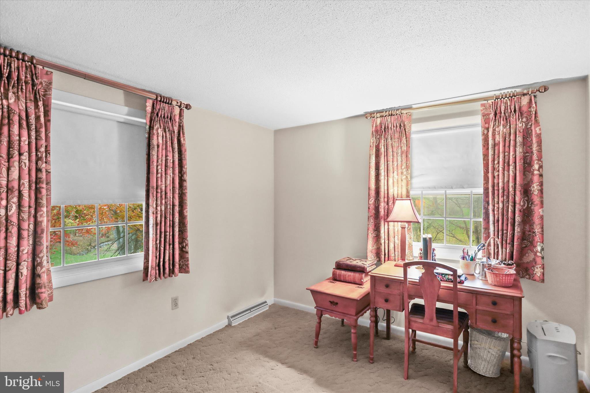 114 Lexington Road York, PA 17402 - Photo 26 of 49 a room with a window and a table chair