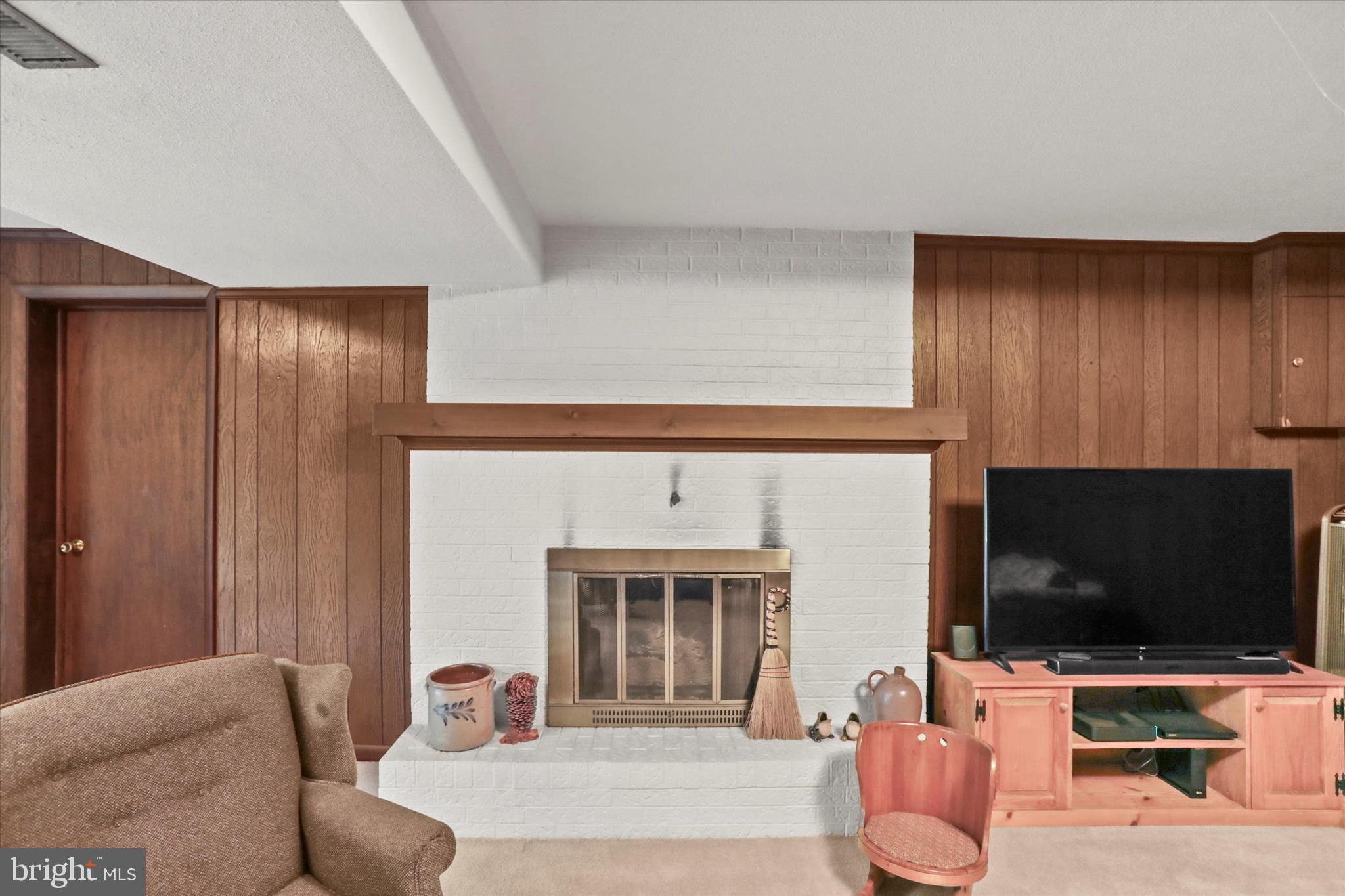 114 Lexington Road York, PA 17402 - Photo 31 of 49 a living room with furniture and a flat screen tv