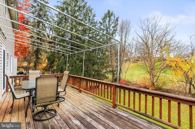 a view of a chairs on the roof deck