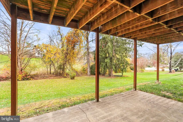 a view of yard with swimming pool