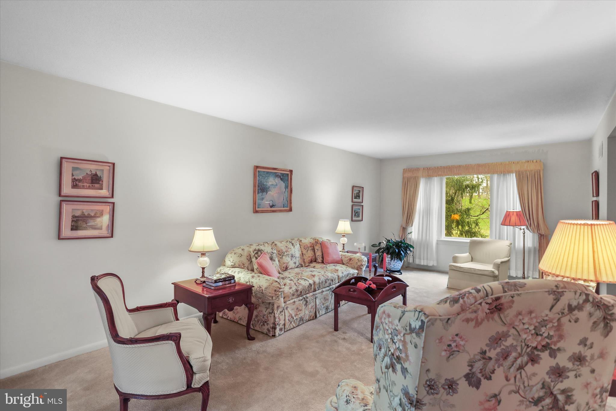 114 Lexington Road York, PA 17402 - Photo 7 of 49 a living room with furniture and a large window