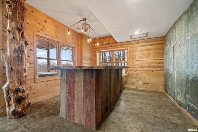 wooden floor with white walls