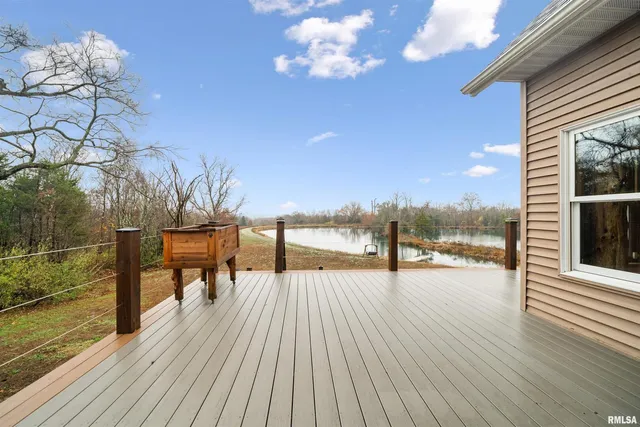 a view of a terrace with wooden floor and seating space