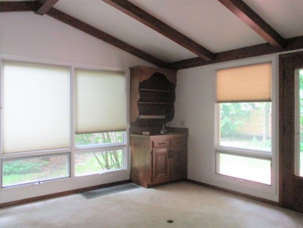 512 Highland Road Hinsdale, IL 60521 - Photo 11 of 25 an empty room with windows