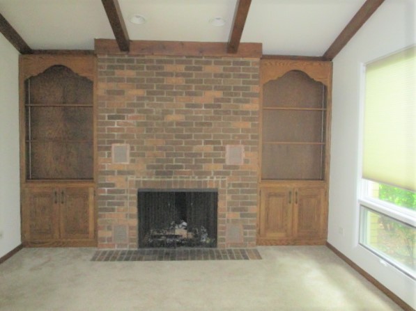 512 Highland Road Hinsdale, IL 60521 - Photo 12 of 25 a room with a fireplace